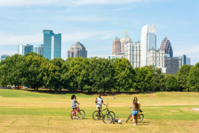friends biking on the field